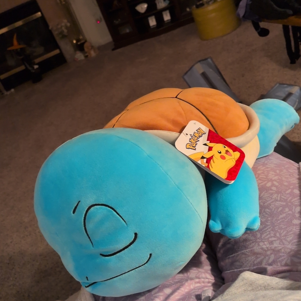 Pokemon Squirtle Plush with Blue and Orange ColorsPokemon Sleeping Squirtle Plus